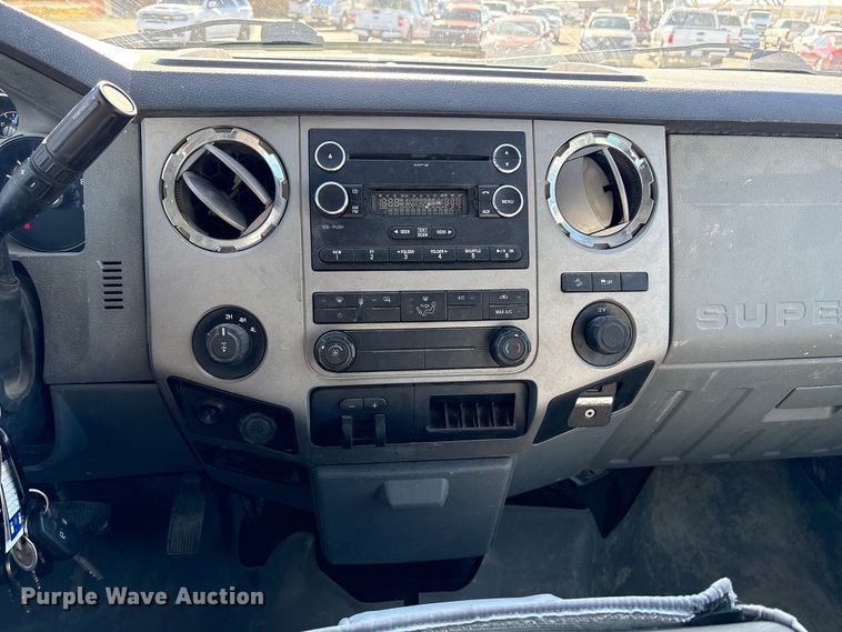 image for item EC8122 2015 Ford F250 Super Duty XLT Crew Cab utility bed pickup truck