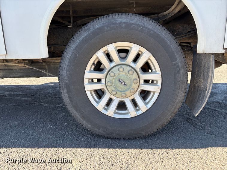 image for item EC8122 2015 Ford F250 Super Duty XLT Crew Cab utility bed pickup truck