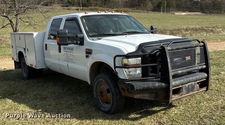 image for item ED2375 2009 Ford F350 Super Duty  Crew Cab utility bed pickup truck