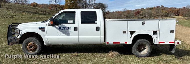 image for item ED2375 2009 Ford F350 Super Duty  Crew Cab utility bed pickup truck