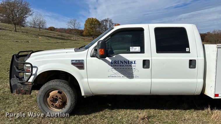 image for item ED2375 2009 Ford F350 Super Duty  Crew Cab utility bed pickup truck