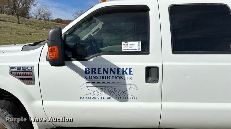 image for item ED2375 2009 Ford F350 Super Duty  Crew Cab utility bed pickup truck