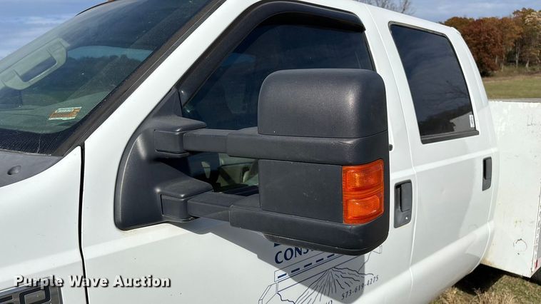 image for item ED2375 2009 Ford F350 Super Duty  Crew Cab utility bed pickup truck