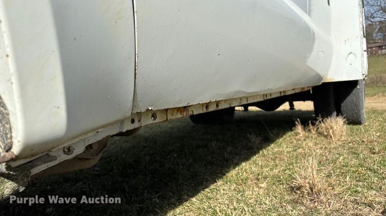 image for item ED2375 2009 Ford F350 Super Duty  Crew Cab utility bed pickup truck