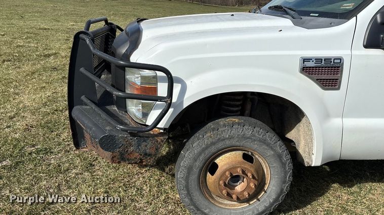 image for item ED2375 2009 Ford F350 Super Duty  Crew Cab utility bed pickup truck