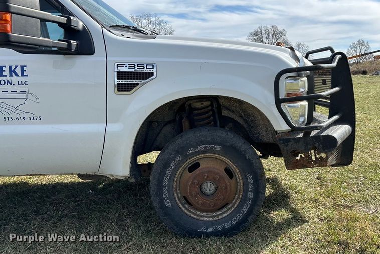 image for item ED2375 2009 Ford F350 Super Duty  Crew Cab utility bed pickup truck