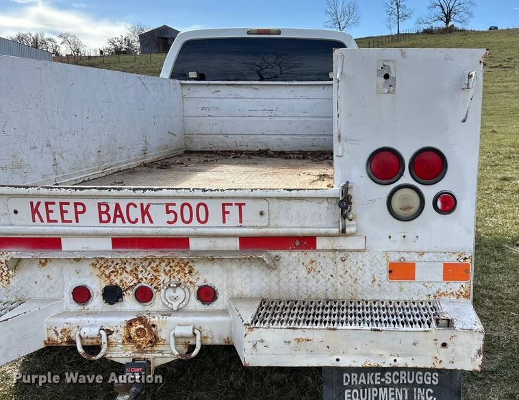 image for item ED2375 2009 Ford F350 Super Duty  Crew Cab utility bed pickup truck