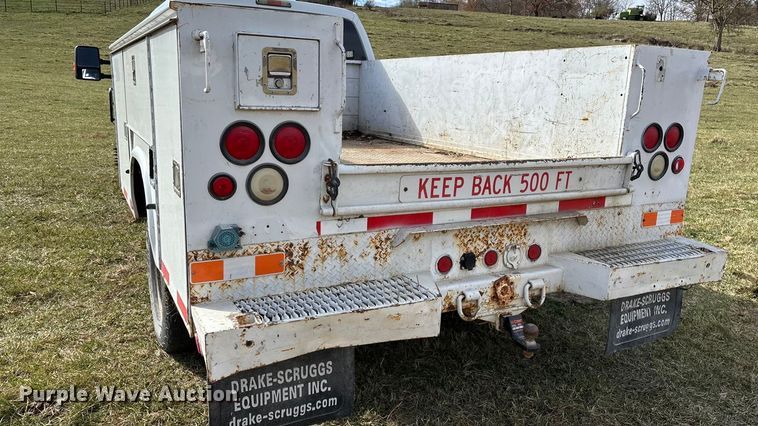 image for item ED2375 2009 Ford F350 Super Duty  Crew Cab utility bed pickup truck