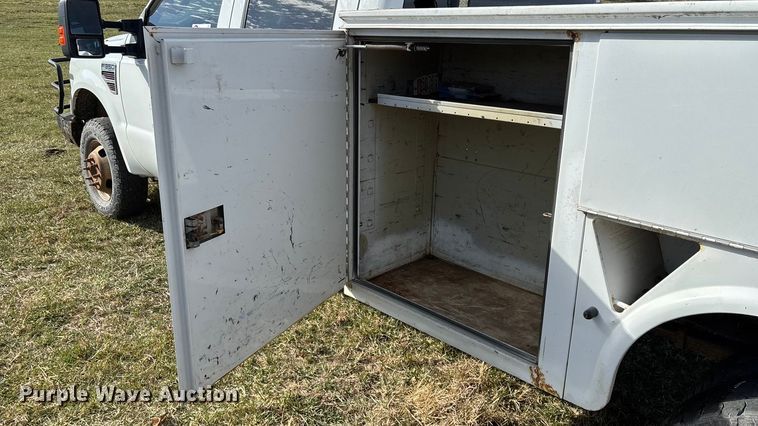 image for item ED2375 2009 Ford F350 Super Duty  Crew Cab utility bed pickup truck