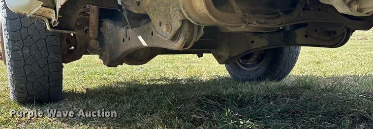 image for item ED2375 2009 Ford F350 Super Duty  Crew Cab utility bed pickup truck