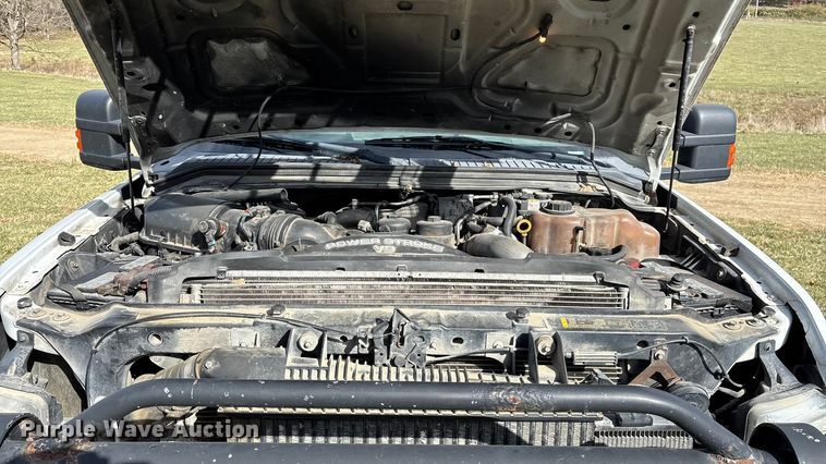 image for item ED2375 2009 Ford F350 Super Duty  Crew Cab utility bed pickup truck