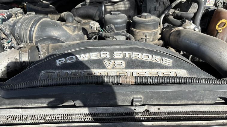 image for item ED2375 2009 Ford F350 Super Duty  Crew Cab utility bed pickup truck