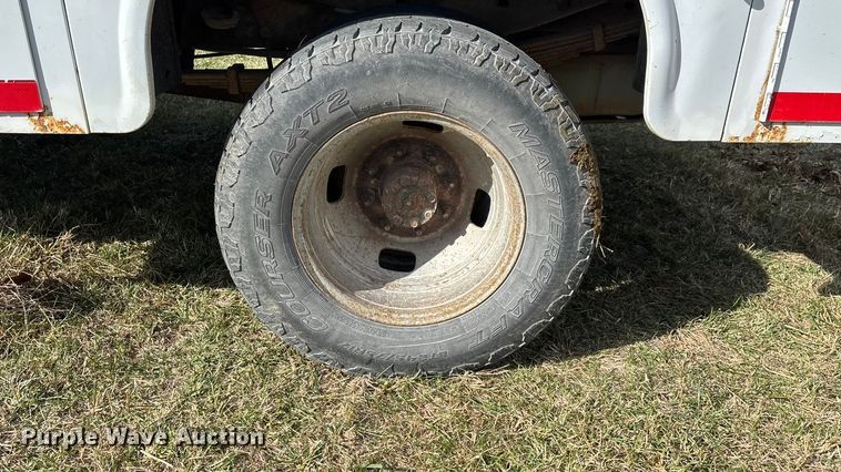 image for item ED2375 2009 Ford F350 Super Duty  Crew Cab utility bed pickup truck