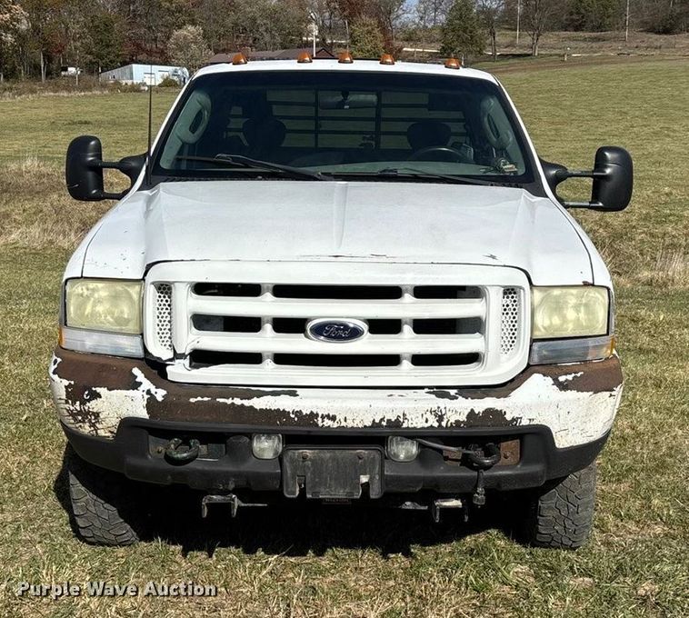 image for item ED2376 2003 Ford F350 Super Duty SuperCab flatbed pickup truck