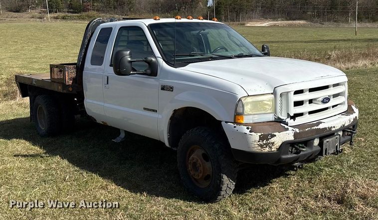 image for item ED2376 2003 Ford F350 Super Duty SuperCab flatbed pickup truck