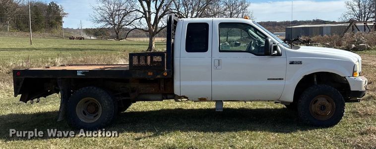image for item ED2376 2003 Ford F350 Super Duty SuperCab flatbed pickup truck