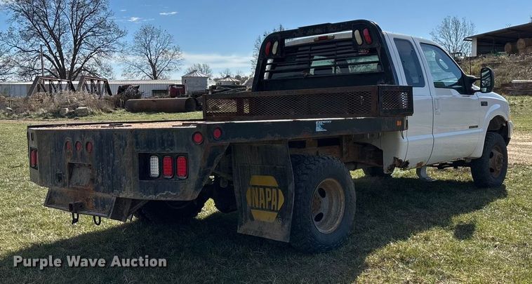 image for item ED2376 2003 Ford F350 Super Duty SuperCab flatbed pickup truck