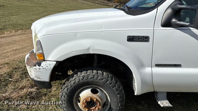 image for item ED2376 2003 Ford F350 Super Duty SuperCab flatbed pickup truck