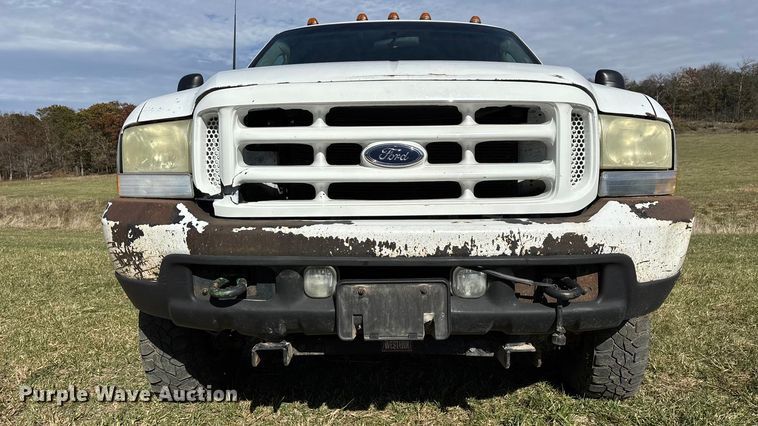 image for item ED2376 2003 Ford F350 Super Duty SuperCab flatbed pickup truck