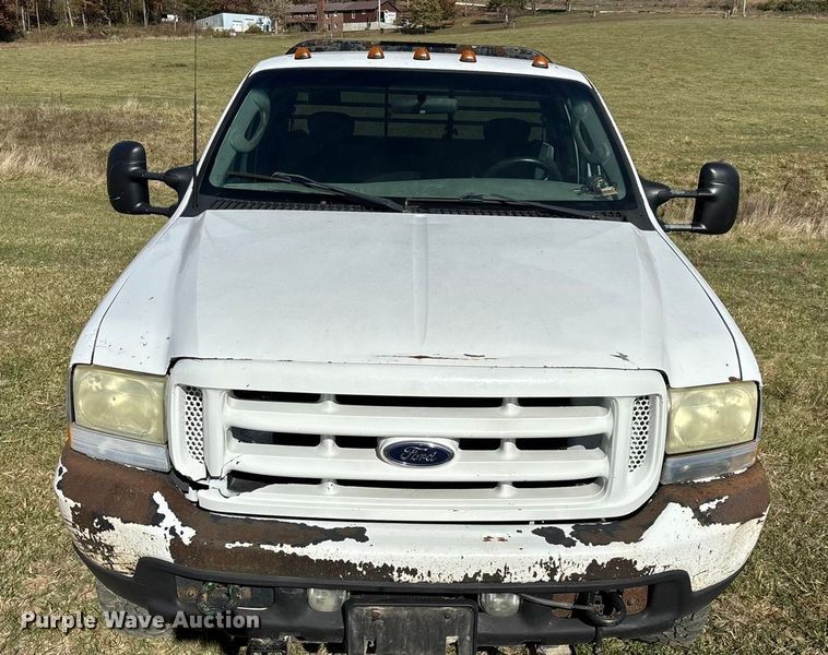image for item ED2376 2003 Ford F350 Super Duty SuperCab flatbed pickup truck