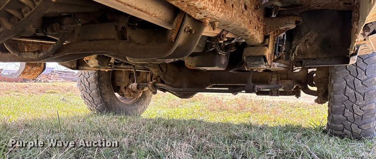 image for item ED2376 2003 Ford F350 Super Duty SuperCab flatbed pickup truck