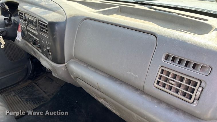 image for item ED2376 2003 Ford F350 Super Duty SuperCab flatbed pickup truck