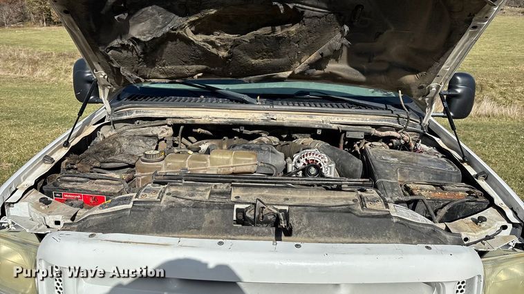 image for item ED2376 2003 Ford F350 Super Duty SuperCab flatbed pickup truck