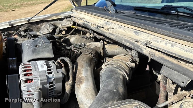 image for item ED2376 2003 Ford F350 Super Duty SuperCab flatbed pickup truck