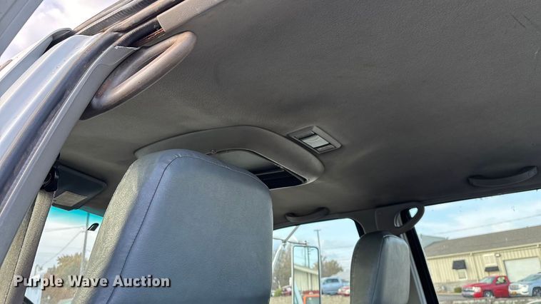 image for item ED2398 1997 GMC C6500 Crew Cab flatbed truck