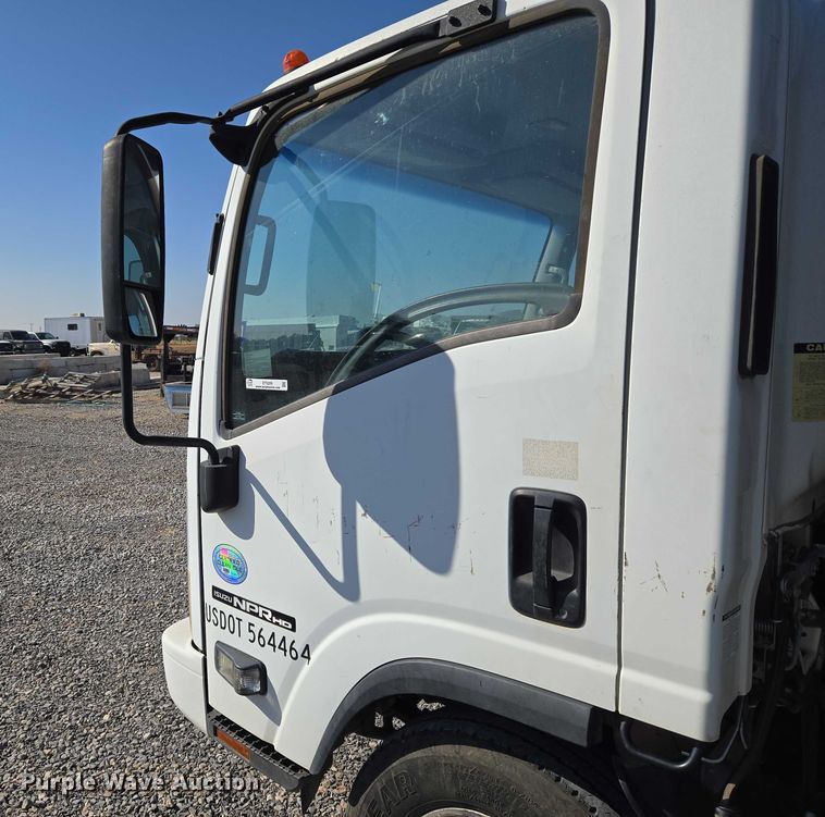 image for item ET5259 2012 Isuzu NPR flatbed truck