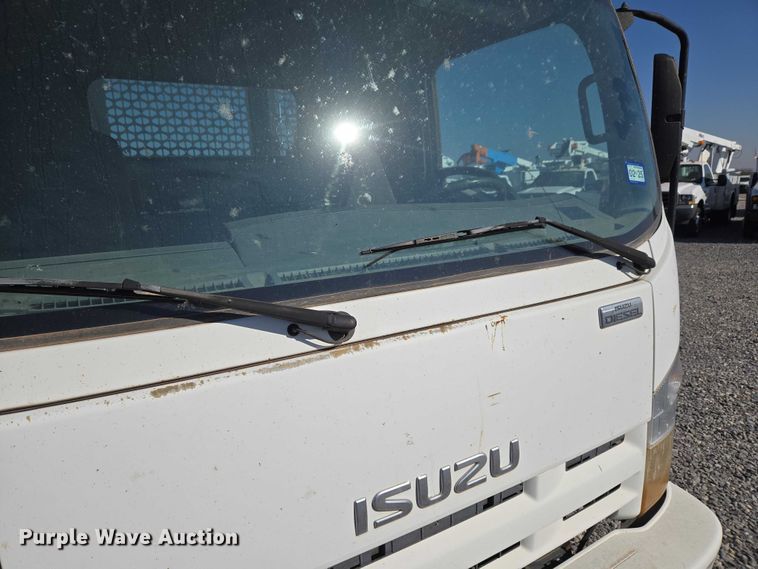 image for item ET5259 2012 Isuzu NPR flatbed truck