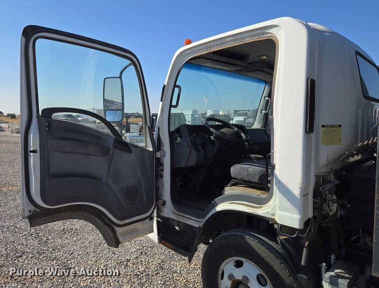 image for item ET5259 2012 Isuzu NPR flatbed truck