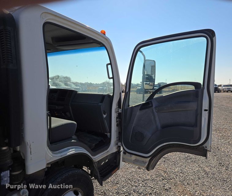 image for item ET5259 2012 Isuzu NPR flatbed truck