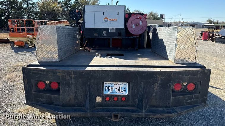 image for item EU5400 2014 RAM 3500 Crew Cab flatbed pickup truck