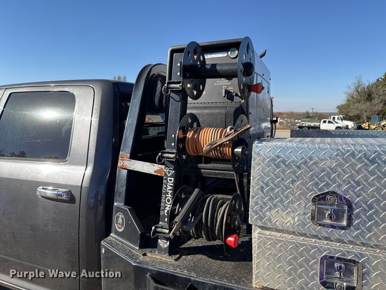 image for item EU5401 2014 RAM 3500 Crew Cab flatbed pickup truck