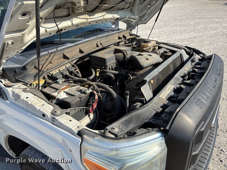 image for item EV3317 2012 Ford F250 Super Duty Extended Cab Utility Bed Pickup