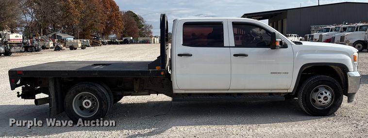 image for item EV3318 2015 GMC Sierra 3500 Crew Cab flatbed pickup truck