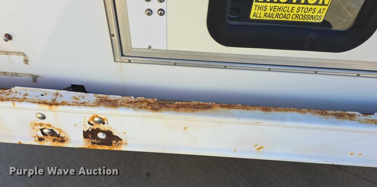 image for item FI0680 2014 Ford E450 Super Duty shuttle bus