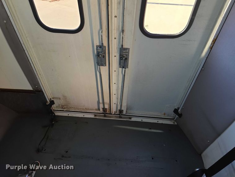 image for item FI0680 2014 Ford E450 Super Duty shuttle bus