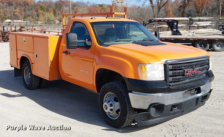 image for item FK0554 2011 GMC  Sierra 3500HD utility bed pickup truck