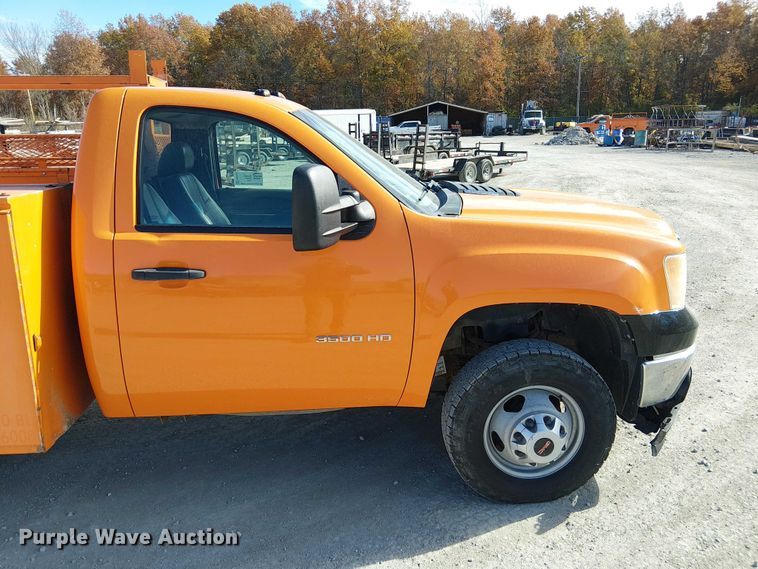 image for item FK0554 2011 GMC  Sierra 3500HD utility bed pickup truck