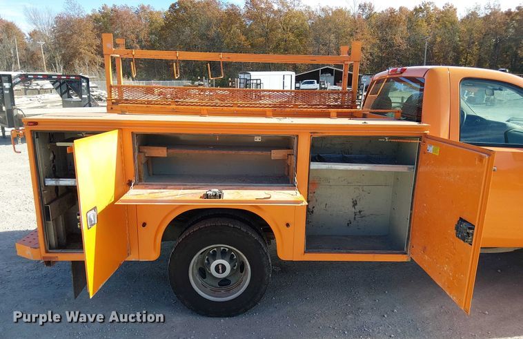 image for item FK0554 2011 GMC  Sierra 3500HD utility bed pickup truck