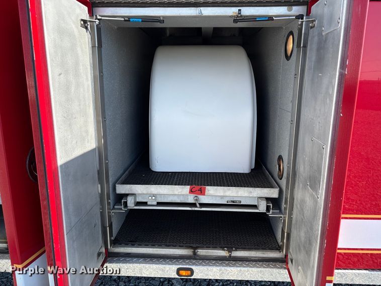 image for item YA1212 2000 Freightliner FL112 tractor-drawn aerial fire truck