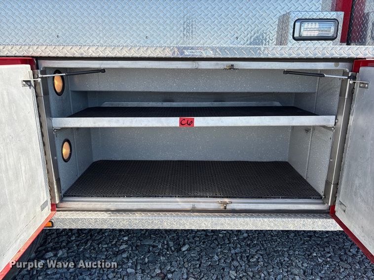 image for item YA1212 2000 Freightliner FL112 tractor-drawn aerial fire truck