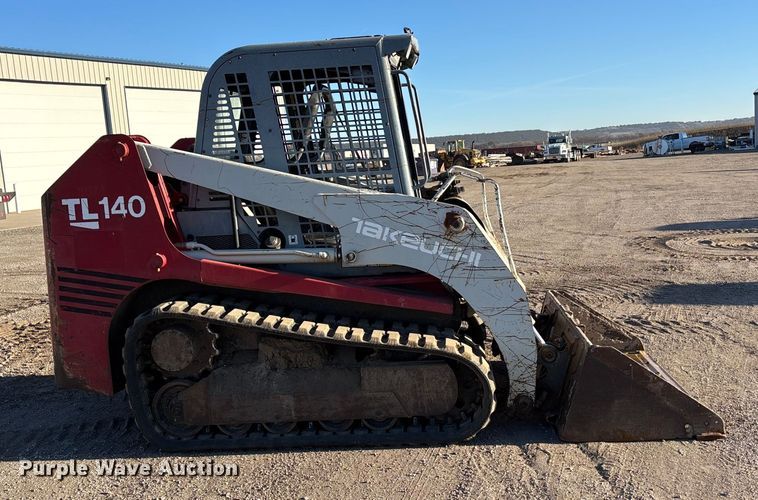 MINI CARGADOR SOBRE ORUGAS 2007 TAKEUCHI TL140