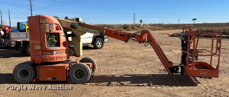 image for item DQ7716 JLG E300AJP boom lift