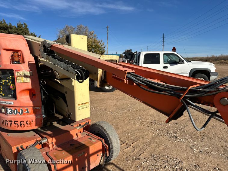 image for item DQ7716 JLG E300AJP boom lift