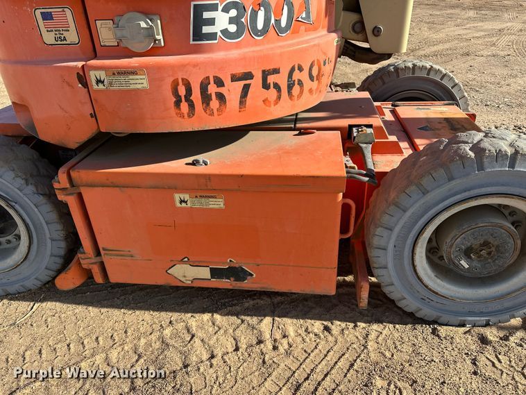 image for item DQ7716 JLG E300AJP boom lift