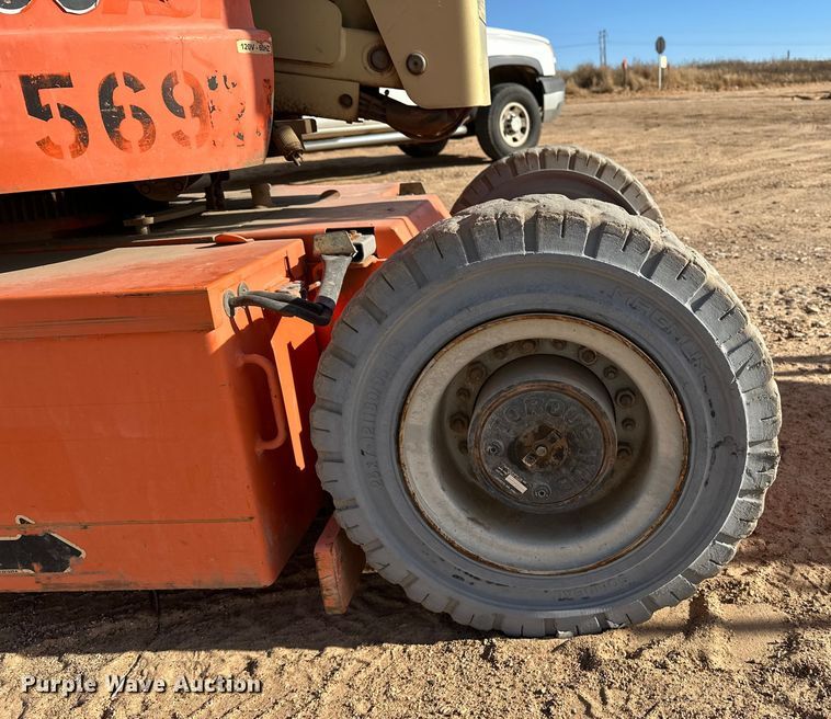 image for item DQ7716 JLG E300AJP boom lift
