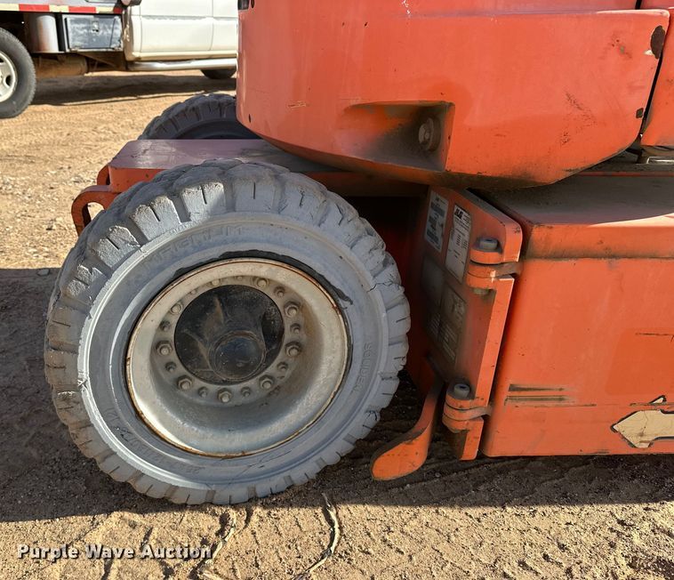 image for item DQ7716 JLG E300AJP boom lift